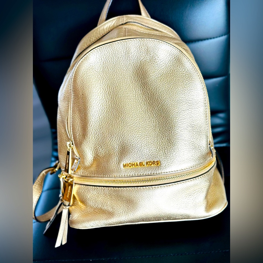 Michael Kors golden backpack